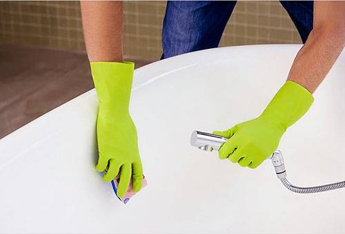 How can you clean acrylic bathtubs at home?